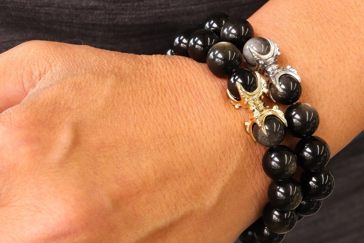 魔除け・厄除け・開運のお守り。金銀に輝く黒曜石を纏う五鈷杵 魔除け・厄除け・開運のお守り。金銀に輝く黒曜石を纏う五鈷杵